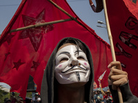 A protester takes part in Labor Day demonstrations outside the presidential palace on May 1, 2019 in Manila, Philippines. Thousands of Filip...