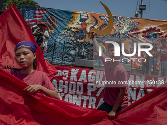 Protesters take part in Labor Day demonstrations outside the presidential palace on May 1, 2019 in Manila, Philippines. Thousands of Filipin...