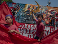 Protesters take part in Labor Day demonstrations outside the presidential palace on May 1, 2019 in Manila, Philippines. Thousands of Filipin...