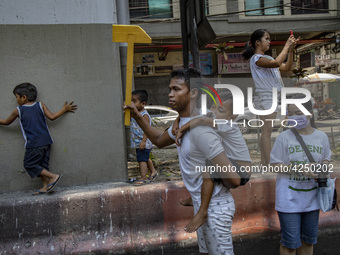 Protesters take part in Labor Day demonstrations outside the presidential palace on May 1, 2019 in Manila, Philippines. Thousands of Filipin...