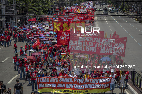 Protesters take part in Labor Day demonstrations outside the presidential palace on May 1, 2019 in Manila, Philippines. Thousands of Filipin...