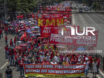 Protesters take part in Labor Day demonstrations outside the presidential palace on May 1, 2019 in Manila, Philippines. Thousands of Filipin...