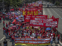 Protesters take part in Labor Day demonstrations outside the presidential palace on May 1, 2019 in Manila, Philippines. Thousands of Filipin...