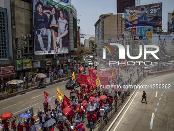 Protesters take part in Labor Day demonstrations outside the presidential palace on May 1, 2019 in Manila, Philippines. Thousands of Filipin...