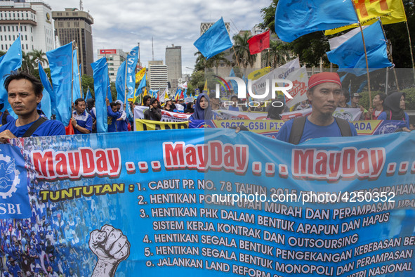 Jakarta, 01 May 2019 : Labors with may day banner and they demandiing for better labors future in Indonesia. Thousands of Labor filled Merde...