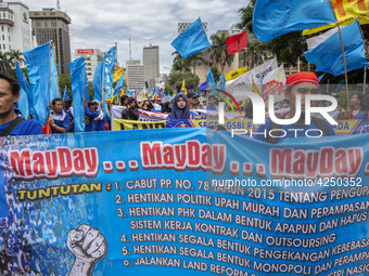 Jakarta, 01 May 2019 : Labors with may day banner and they demandiing for better labors future in Indonesia. Thousands of Labor filled Merde...