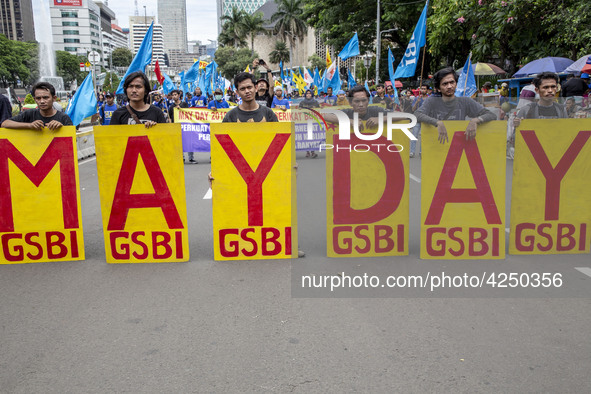 Jakarta, 01 May 2019 : "May Day" letters held during the demonstration. Thousands of Labor filled Merdeka Barat Street Jakarta celebrating M...