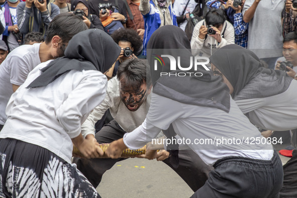 Jakarta, 01 May 2019 : Theatrical performance during the demonstration. Thousands of Labor filled Merdeka Barat Street Jakarta celebrating M...