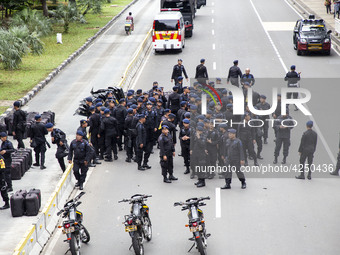 Jakarta, 01 May 2019 : Mobile Brigade Police Squad during the demonstration on guard. Thousands of Labor filled Merdeka Barat Street Jakarta...