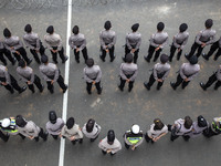 Jakarta, 01 May 2019 : Police form in guarding the demonstration. Thousands of Labor filled Merdeka Barat Street Jakarta celebrating May Day...