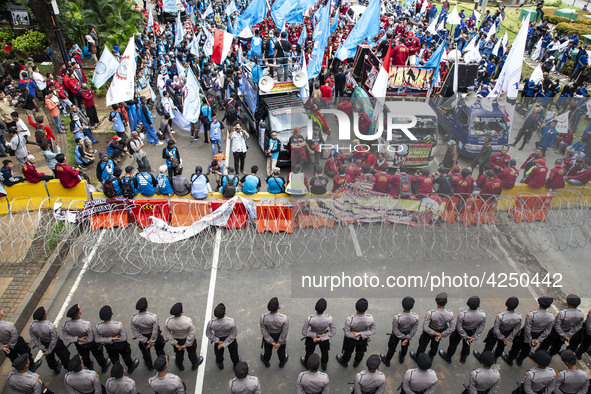 Jakarta, 01 May 2019 : Police blockade and labors. Thousands of Labor filled Merdeka Barat Street Jakarta celebrating May Day. They demandin...