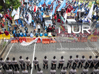 Jakarta, 01 May 2019 : Police blockade and labors. Thousands of Labor filled Merdeka Barat Street Jakarta celebrating May Day. They demandin...