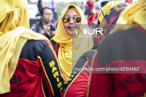 Jakarta, 01 May 2019 : Labor woman participant expression during the demonstration.  Thousands of Labor filled Merdeka Barat Street Jakarta...