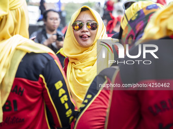 Jakarta, 01 May 2019 : Labor woman participant expression during the demonstration.  Thousands of Labor filled Merdeka Barat Street Jakarta...