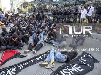 Jakarta, 01 May 2019 : Students that done anarchy demonstration in the morning heavily guard by the police. Thousands of Labor filled Merdek...