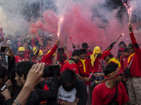 Jakarta, 01 May 2019 : Firecracker lit by labors at the end of the demonstration. Thousands of Labor filled Merdeka Barat Street Jakarta cel...