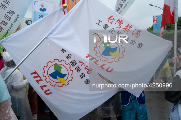 Flags belonging from the syndicate worker group from  Taiwan Tobacco and Liquor Corp During 2019 Labor Day March 6,000 workers took the stre...