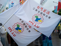 Flags belonging from the syndicate worker group from  Taiwan Tobacco and Liquor Corp During 2019 Labor Day March 6,000 workers took the stre...