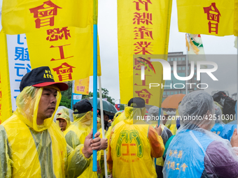 Protesters calling for more holidays, paid leave, more labour rights protections. During 2019 Labor Day March 6,000 workers took the streets...