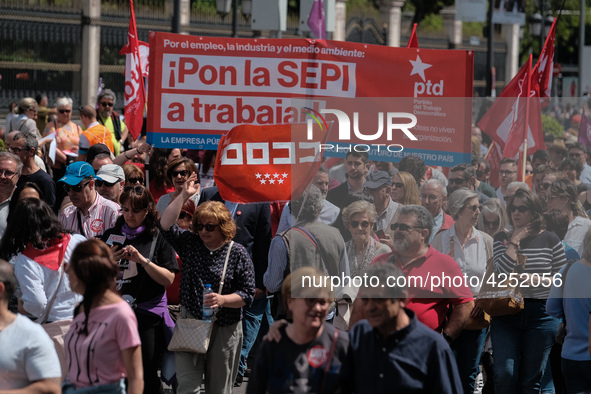 Protesters people' as they take part in the protest called by unions on occasion of May Day celebration in downtown in Madrid, Spain, 01 May...