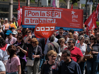 Protesters people' as they take part in the protest called by unions on occasion of May Day celebration in downtown in Madrid, Spain, 01 May...