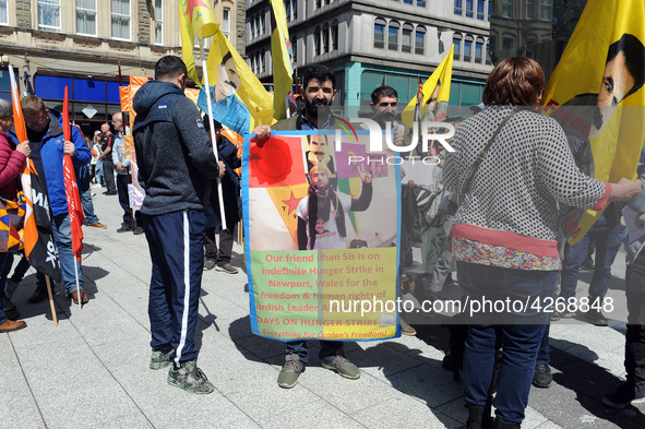 Supporters of Imam Sis members attend May Day March And Rally In Cardiff, Wales, on 1st May 2019.  