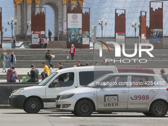 UBER taxi service vehicle drives through the Khreshchatyk street in Kyiv, Ukraine, May 7, 2019. New York Taxi Workers Alliance informs that...