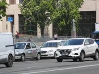 UBER taxi service vehicle is seen parked at the Khreshchatyk street in Kyiv, Ukraine, May 7, 2019. New York Taxi Workers Alliance informs th...