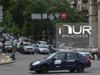 UBER taxi service vehicle drives through the Khreshchatyk street in Kyiv, Ukraine, May 7, 2019. New York Taxi Workers Alliance informs that...