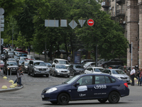 UBER taxi service vehicle drives through the Khreshchatyk street in Kyiv, Ukraine, May 7, 2019. New York Taxi Workers Alliance informs that...