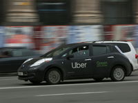 UBER taxi service vehicle drives through the Khreshchatyk street in Kyiv, Ukraine, May 7, 2019. New York Taxi Workers Alliance informs that...