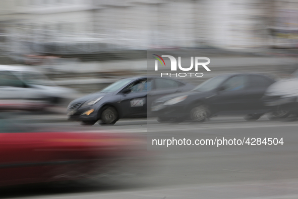 UBER taxi service vehicle drives through the Khreshchatyk street in Kyiv, Ukraine, May 7, 2019. New York Taxi Workers Alliance informs that...