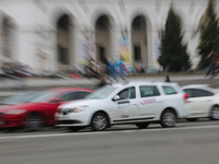 UBER taxi service vehicle drives through the Khreshchatyk street in Kyiv, Ukraine, May 7, 2019. New York Taxi Workers Alliance informs that...