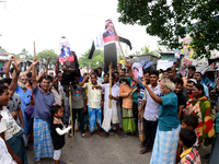 Bangladeshi Jute mill workers stage a road block demonstration to demanding arrears and fair wages at Demra in Dhaka, Bangladesh, on May 11,...