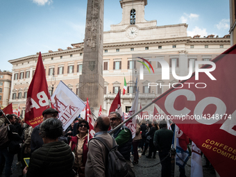 Protest of school workers in front of Palazzo di Montecitorio in Rome at the strike to demand high wage increases, stabilization of precario...