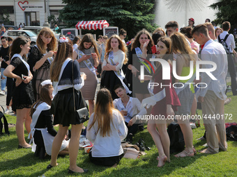 Ukrainian youth celebrates their graduation off the middle school 
with fooling in the fountains at Independence Square in Kyiv,  Ukraine,...