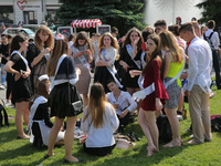 Ukrainian youth celebrates their graduation off the middle school 
with fooling in the fountains at Independence Square in Kyiv,  Ukraine,...