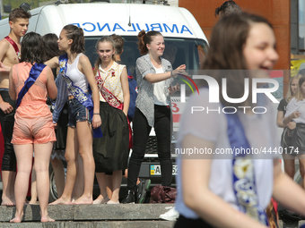 Ukrainian youth celebrates their graduation off the middle school 
with fooling in the fountains at Independence Square in Kyiv,  Ukraine,...