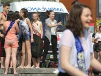 Ukrainian youth celebrates their graduation off the middle school 
with fooling in the fountains at Independence Square in Kyiv,  Ukraine,...