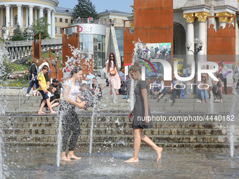 Ukrainian youth celebrates their graduation off the middle school 
with fooling in the fountains at Independence Square in Kyiv,  Ukraine,...