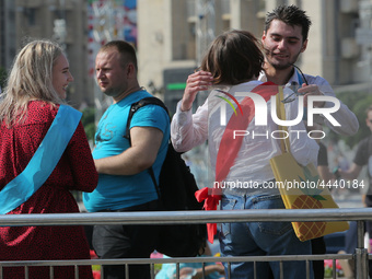 Ukrainian youth celebrates their graduation off the middle school 
with fooling in the fountains at Independence Square in Kyiv,  Ukraine,...