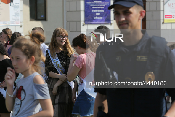 Ukrainian youth celebrates their graduation off the middle school 
with fooling in the fountains at Independence Square in Kyiv,  Ukraine,...