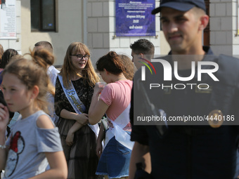 Ukrainian youth celebrates their graduation off the middle school 
with fooling in the fountains at Independence Square in Kyiv,  Ukraine,...