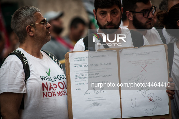 Employees of Whirlpool headquarters in Naples demonstrate against the closure of the plant at the Ministry of Economic Development on June 4...