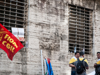 Employees of Whirlpool headquarters in Naples demonstrate against the closure of the plant at the Ministry of Economic Development on June 4...