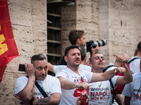 Employees of Whirlpool headquarters in Naples demonstrate against the closure of the plant at the Ministry of Economic Development on June 4...