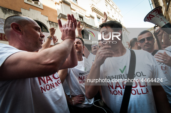 Employees of Whirlpool headquarters in Naples demonstrate against the closure of the plant at the Ministry of Economic Development on June 4...