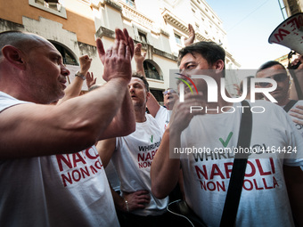 Employees of Whirlpool headquarters in Naples demonstrate against the closure of the plant at the Ministry of Economic Development on June 4...