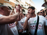 Employees of Whirlpool headquarters in Naples demonstrate against the closure of the plant at the Ministry of Economic Development on June 4...