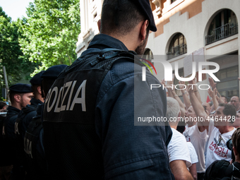 Employees of Whirlpool headquarters in Naples demonstrate against the closure of the plant at the Ministry of Economic Development on June 4...